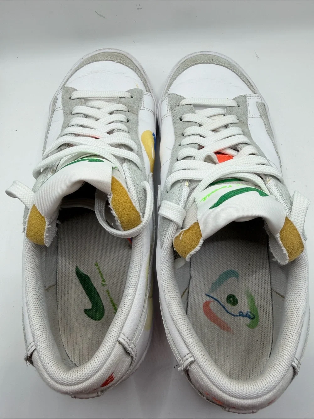 Nike White Low-Top Sneakers with Blue, Green, Yellow and Orange Accents
